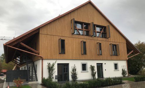 Seitenansicht-Gut-Büchel-Faltschiebelaeden