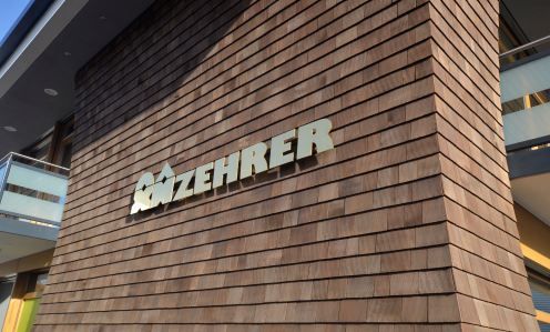Holzbauweise mit Schindeloptik.